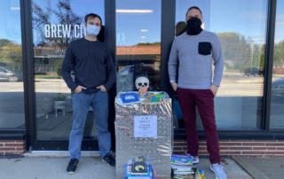 Brew City Marketing Staff Accepting Book Donations for Next Door