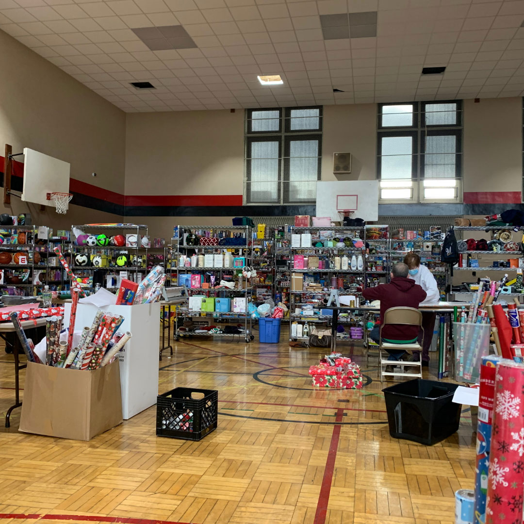 Milwaukee Rescue Mission's basketball court filled with donations from families