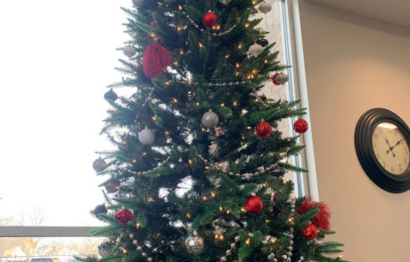 A tall Christmas Tree in the Milwaukee Rescue Mission's foyer
